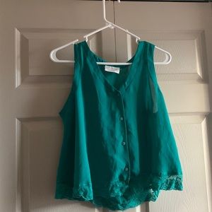Woman’s medium turquoise sheer tank top.